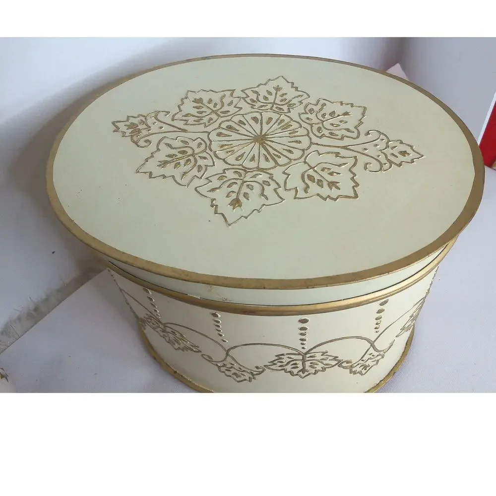 Vtg Ornate Embossed Metal Round Box Gold Cream Floral Footed Hollywood Regency